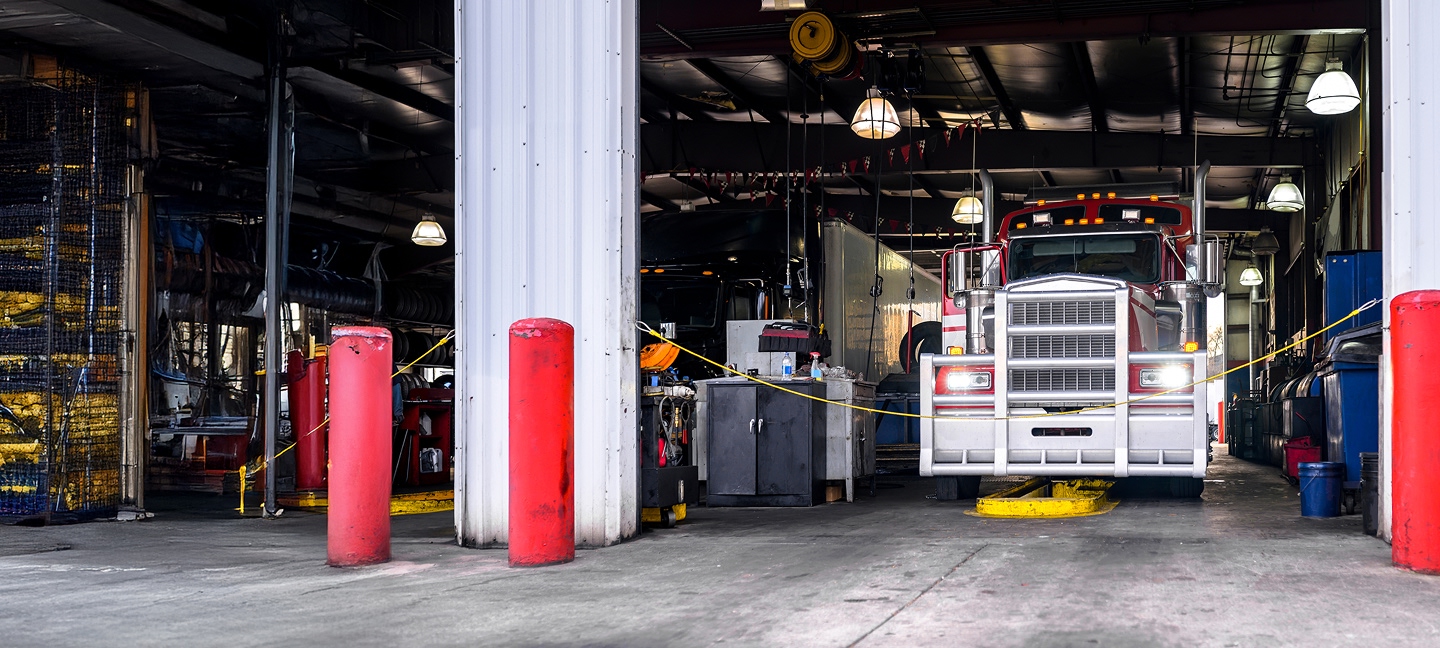 Semi truck in a garage being serviced